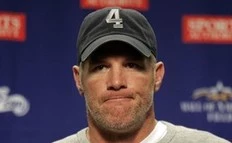 Minnesota Vikings quarterback Brett Favre talks to the media following their NFL football game against the Detroit Lions in Detroit,