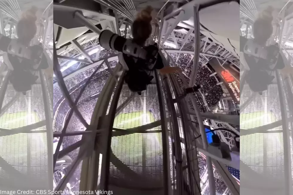 Don’t Look Down! This Photographer Walks High Above US Bank Stadium Crowd