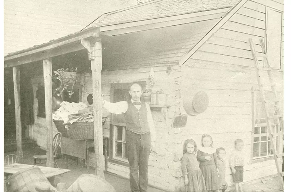 Log cabin building when it was used as a hotel in 1940, photo courtesy of the Stearns History Museum