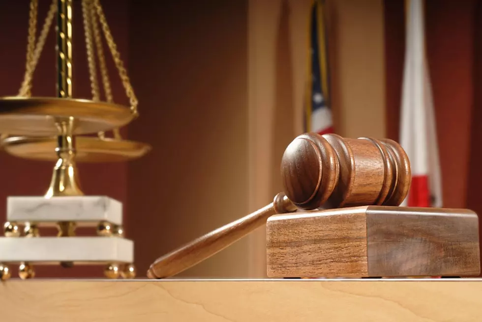 Lawsuit Accuses Law Firm’s Boss of Firings Due to Politics